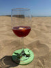 Wine Glass with The Glass Slipper Coaster on a sandy beach